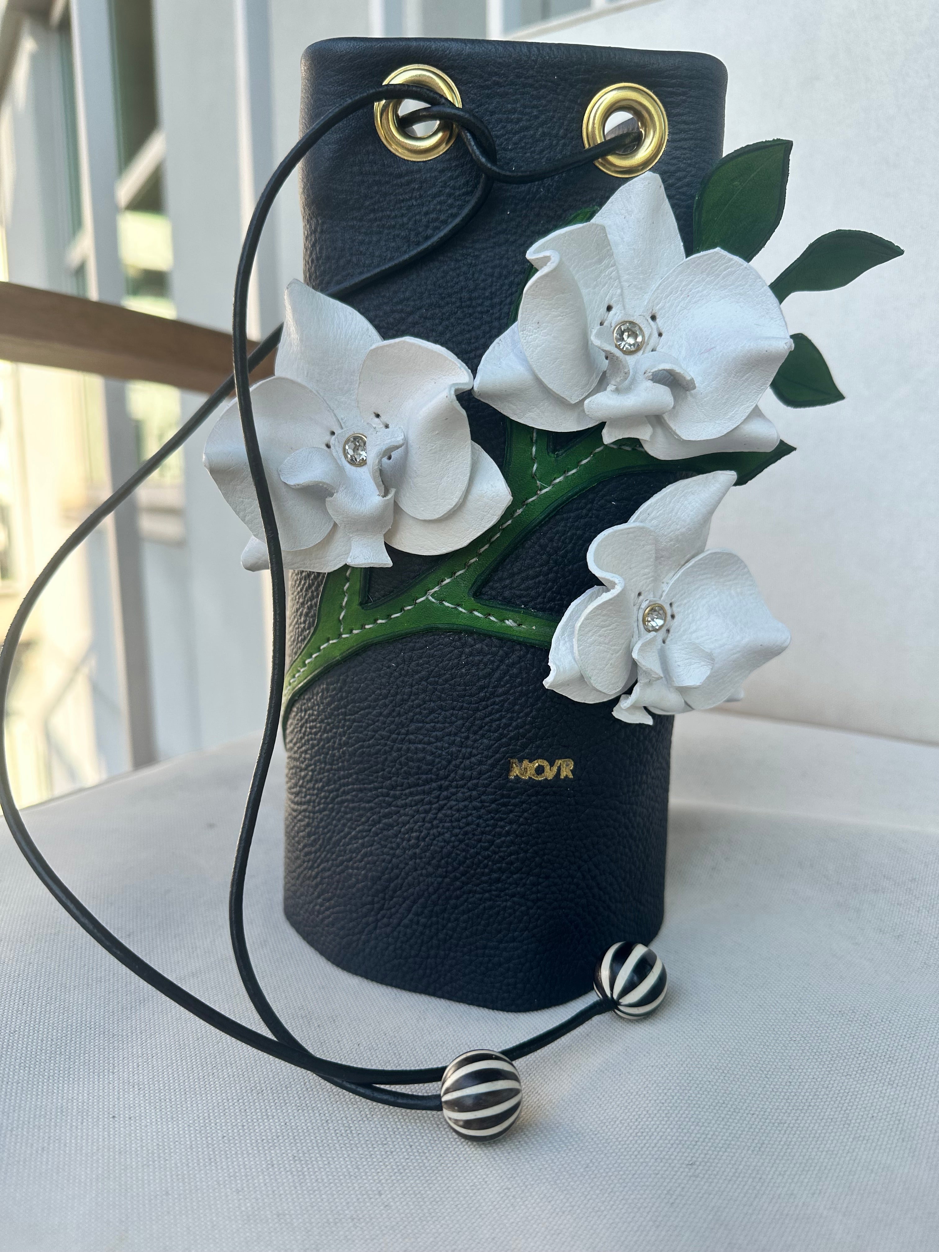 photo of the norehearsal co orchid bag in progress