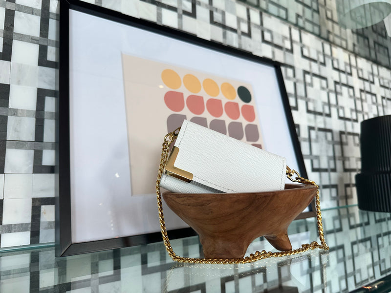 white and gold white italian pebbled leather mini bag by no rehearsal co